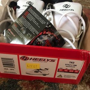 Men’s brand new size 11 Heely’s